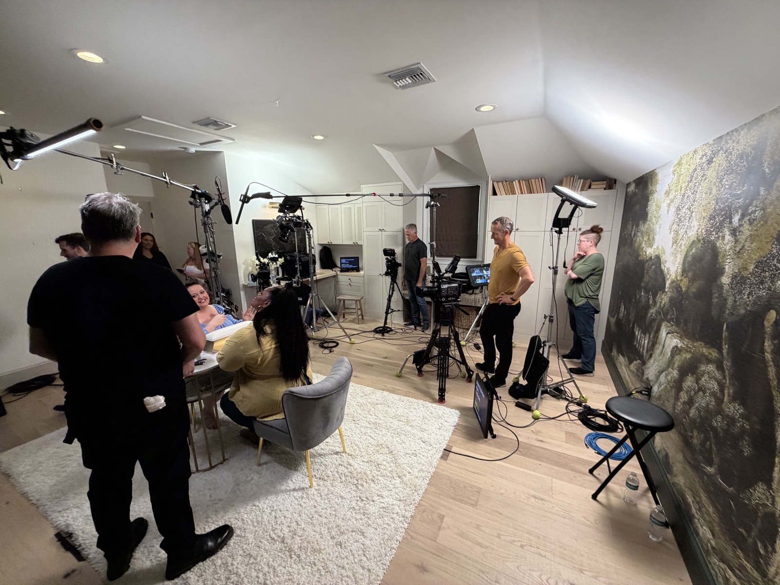 Multi-camera interview setup with teleprompter and boom audio