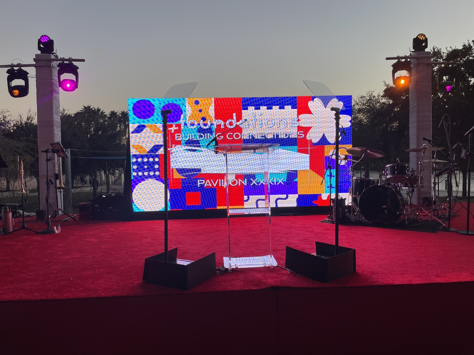 Presidential teleprompter glass at a podium in front of an LED wall